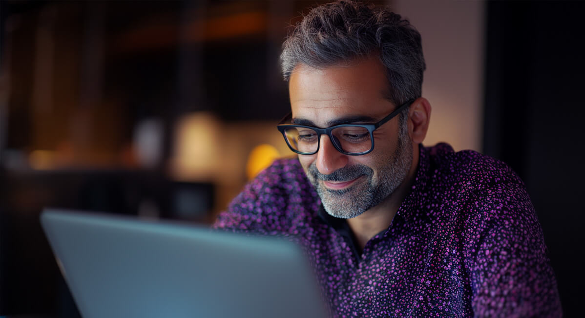 A Man using Risk Llama risk and strategy management software